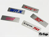 Custom Brushed Steel Console Badges